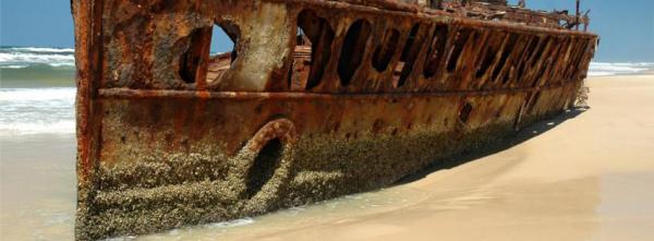 Old Boat on Sandy Beach